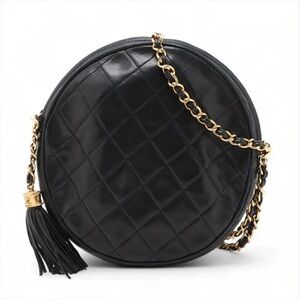 Authentic CHANEL 1986 black lambskin round tassel mini crossbody bag